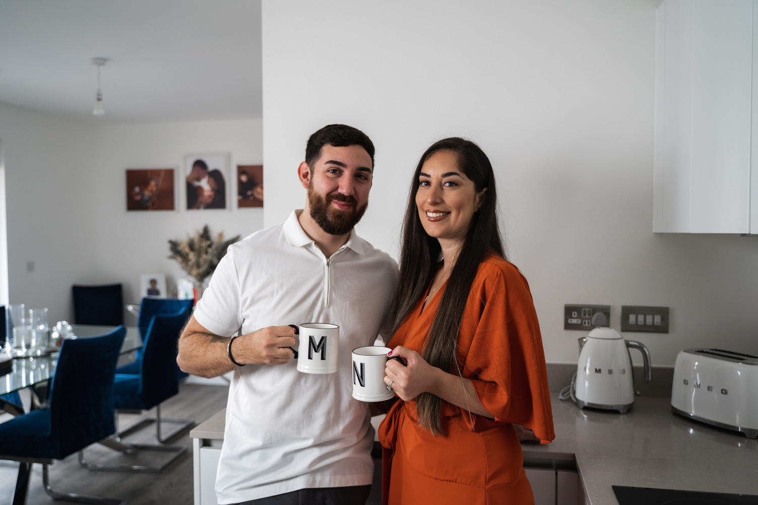 Young Couple happy with their choice of home to start their very own little family.